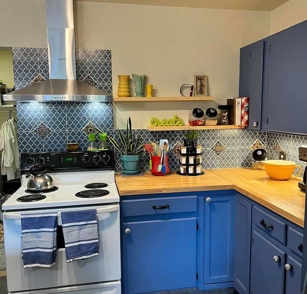 butcher block countertops with blue cabinets