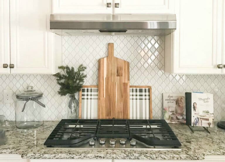 Top dallas white granite with tile backsplash