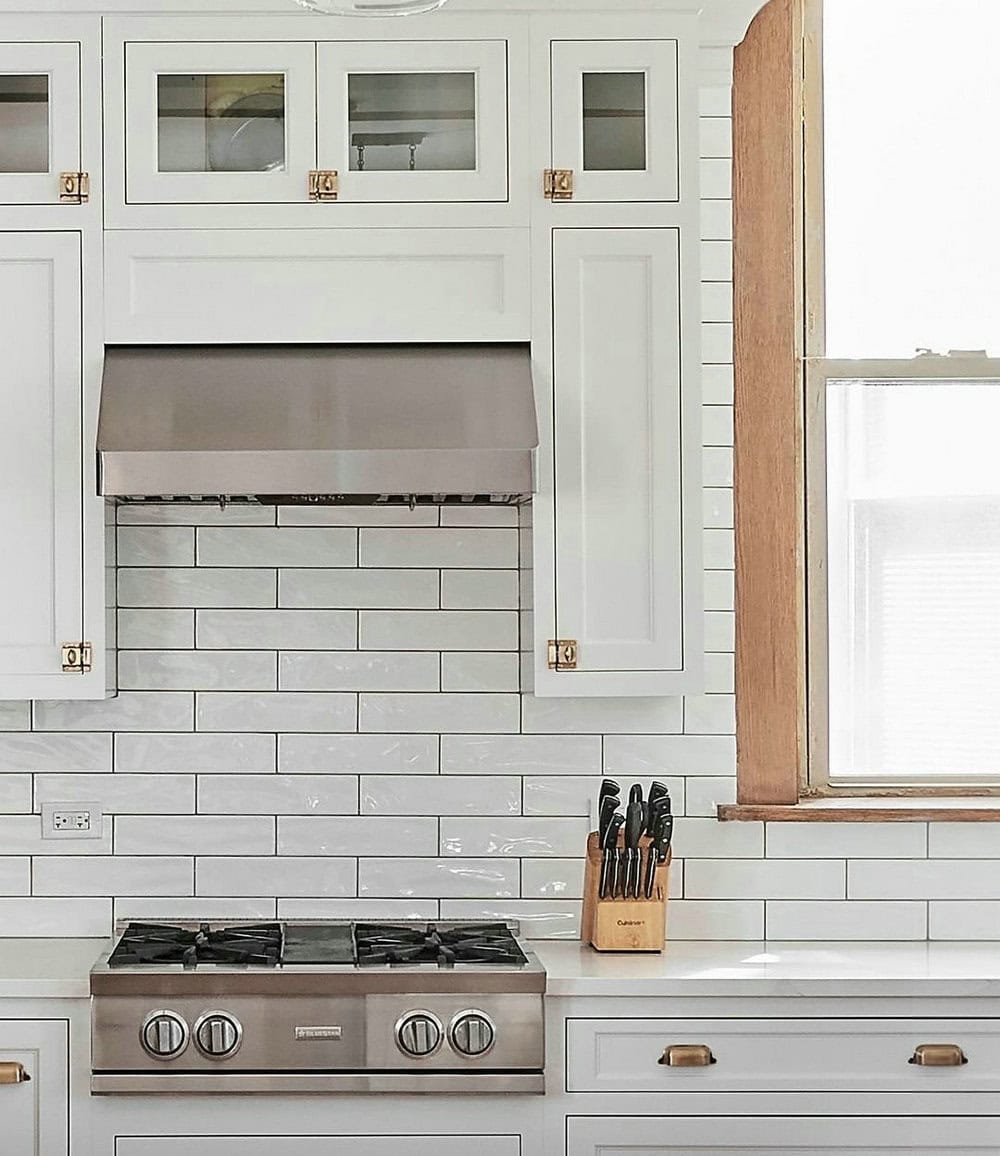 white subway tile with grey grout kitchen