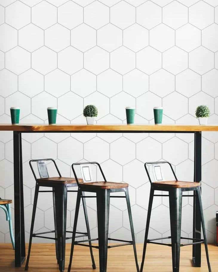 white hexagon tile with gray grout feature