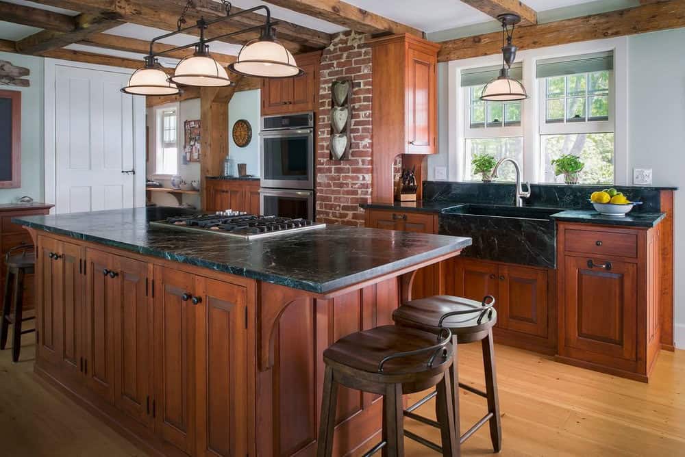 backsplash with cherry cabinets and black granite