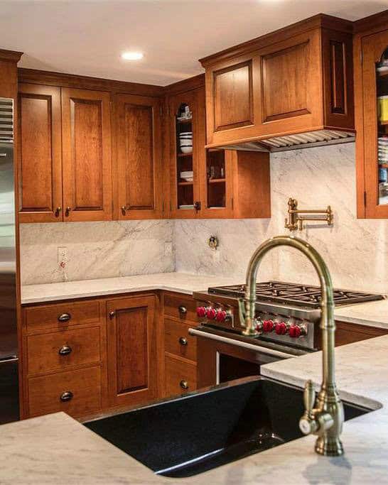 modern kitchen backsplash with cherry cabinets feature