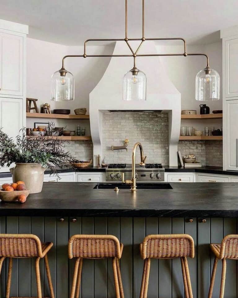 backsplash with black countertops and white cabinets feature