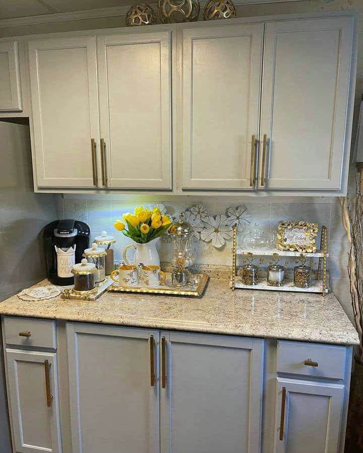 gray cabinets brown granite feature