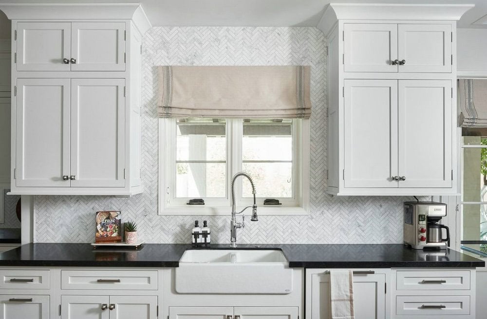 backsplash with dark granite countertops