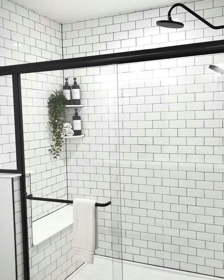 subway tile black grout bathroom feature