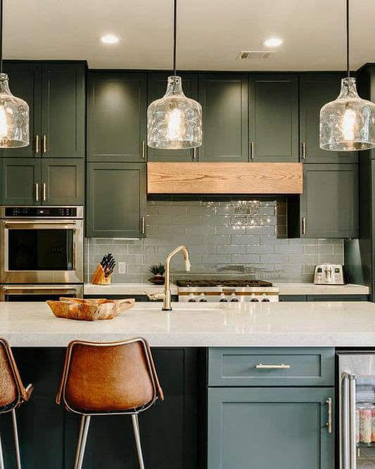 kitchen with dark cabinets and light countertops feature