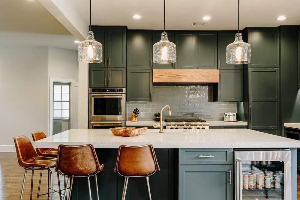 kitchen with dark cabinets and light countertops