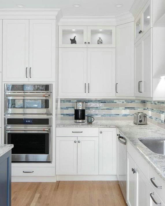 river blue granite with white cabinets feature