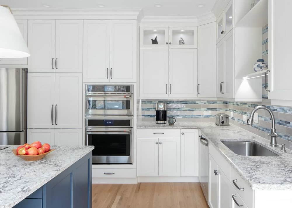 river blue granite with white cabinets