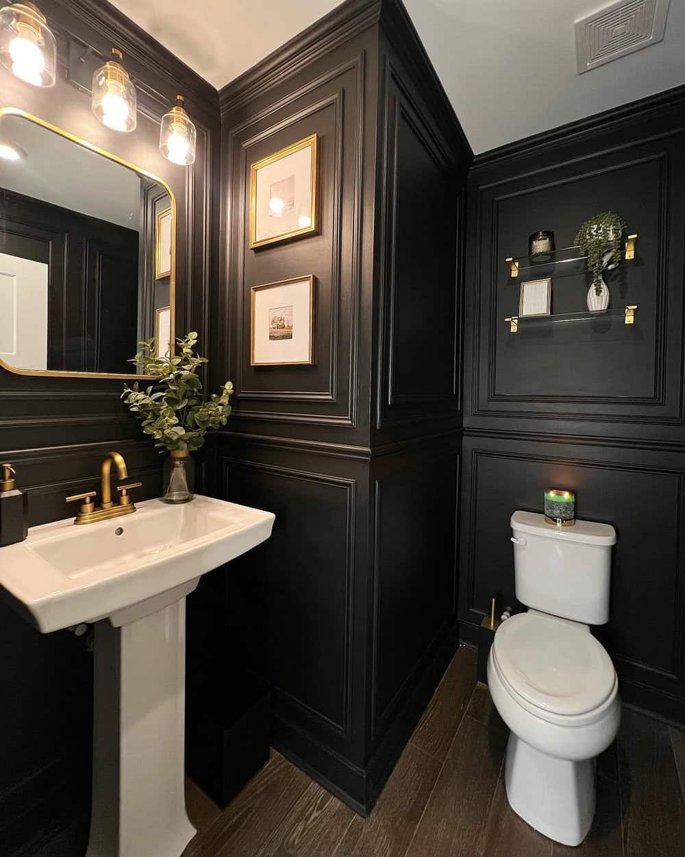 black and gold powder room