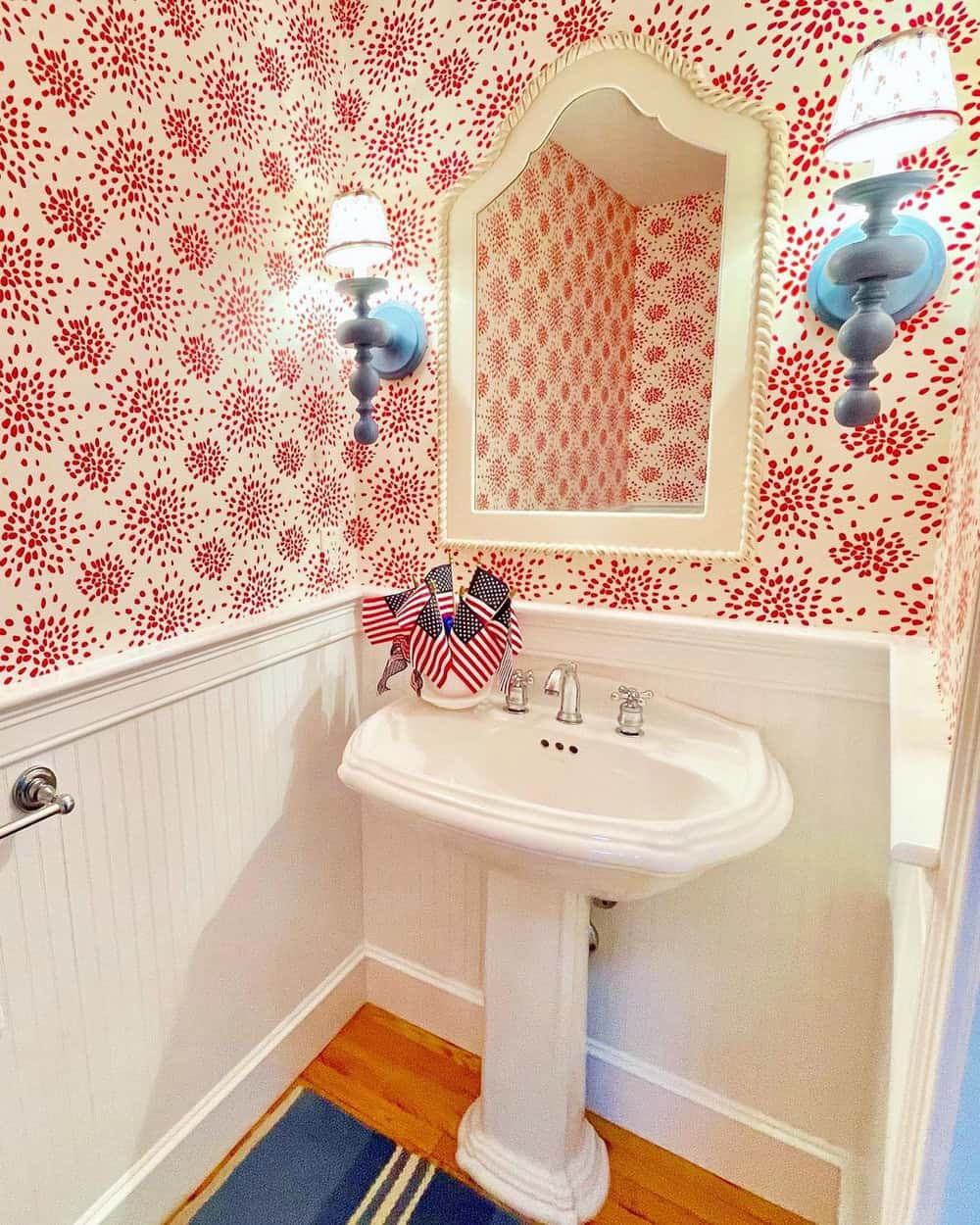 powder room with shiplap and wallpaper