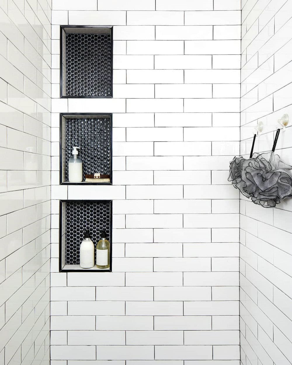 white subway tile black grout bathroom