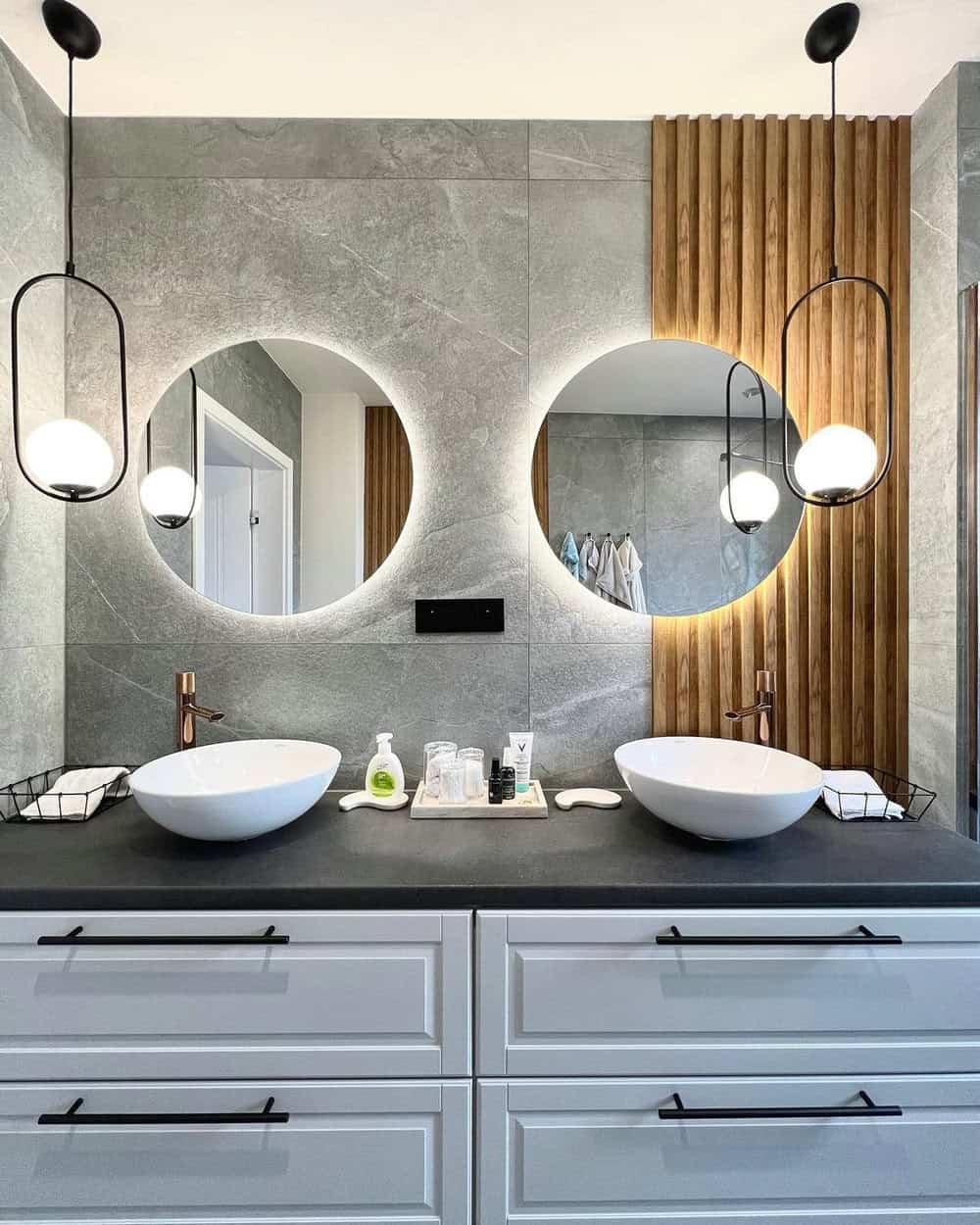 bathroom with gray cabinets