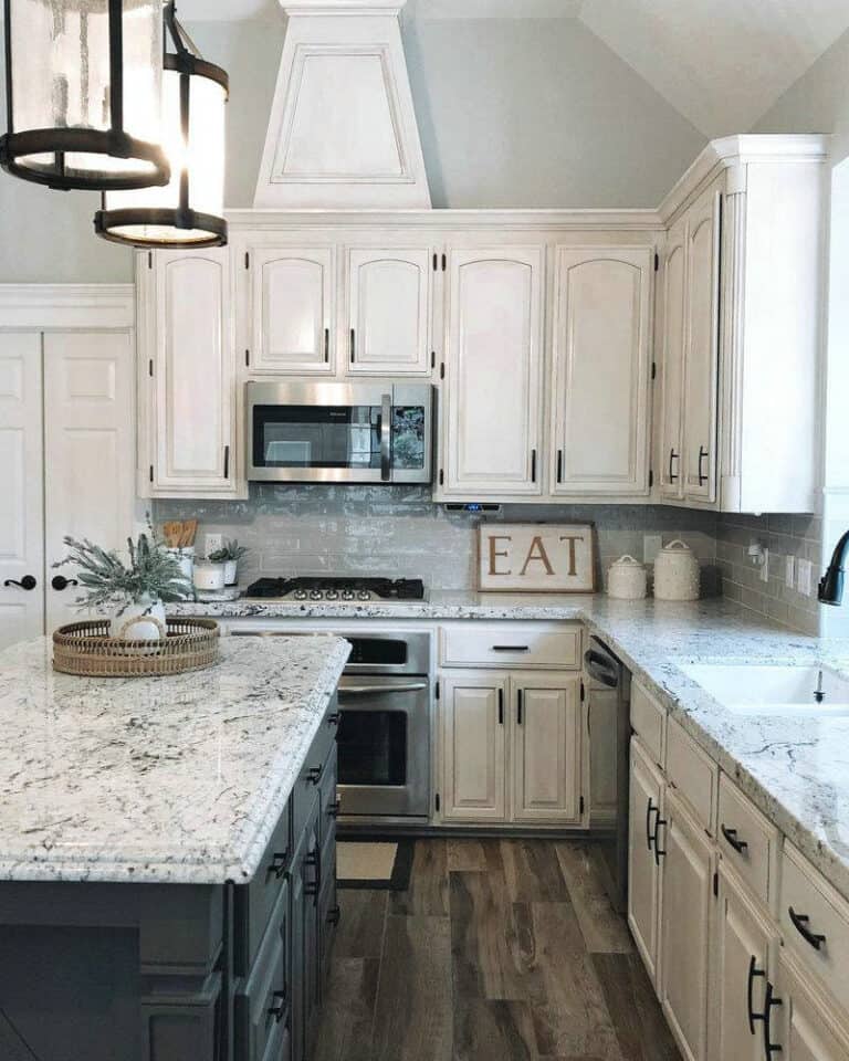 white ice granite with white subway tile backsplash feature