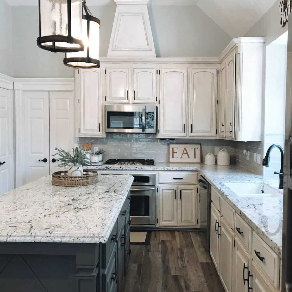 white ice granite with white subway tile backsplash