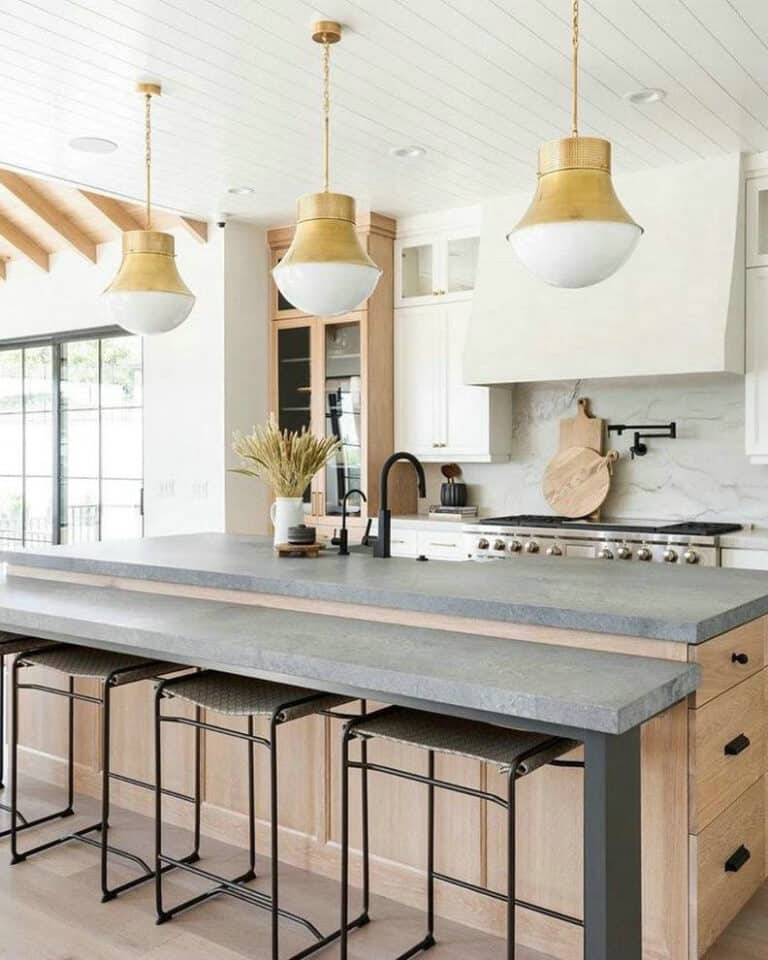 backsplash with grey countertops and white cabinets feature