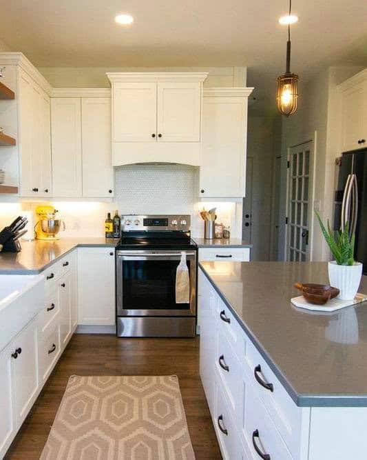 taupe quartz countertops with white cabinets feature