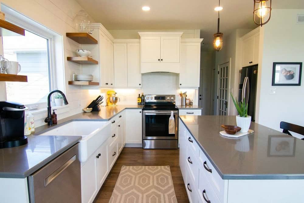 taupe quartz countertops with white cabinets