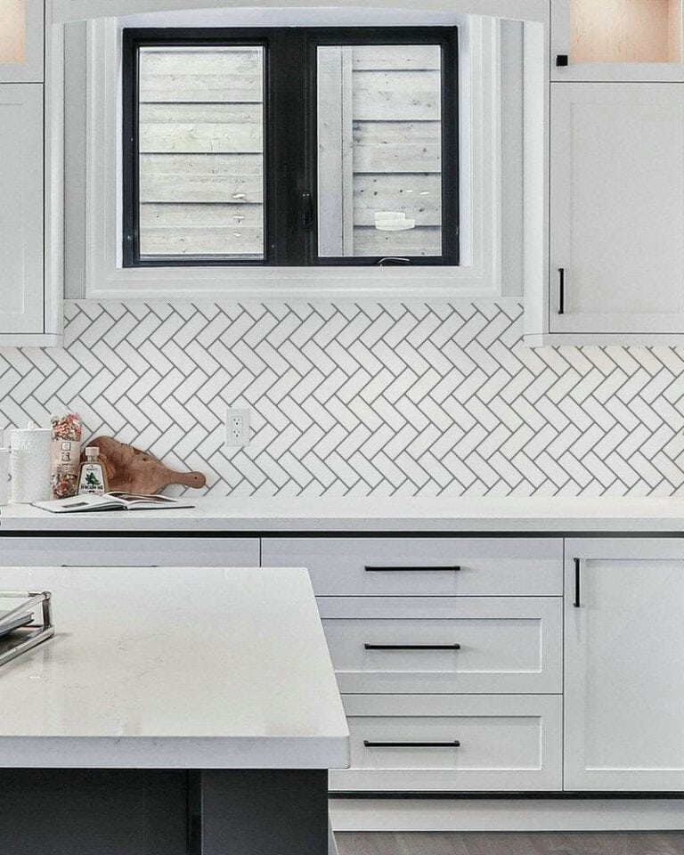 white subway tile with light grey grout kitchen feature