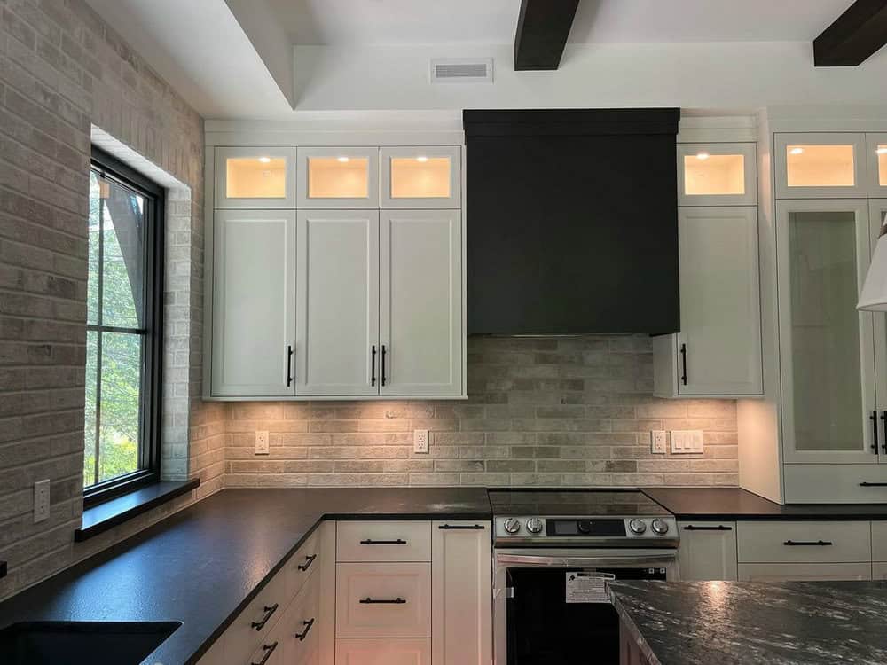 white shaker cabinets with granite countertops