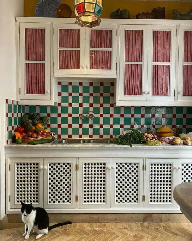 colorful backsplash with white cabinets feature