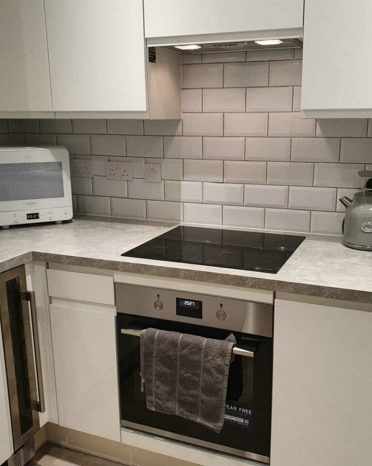 white subway tile with silver grout feature