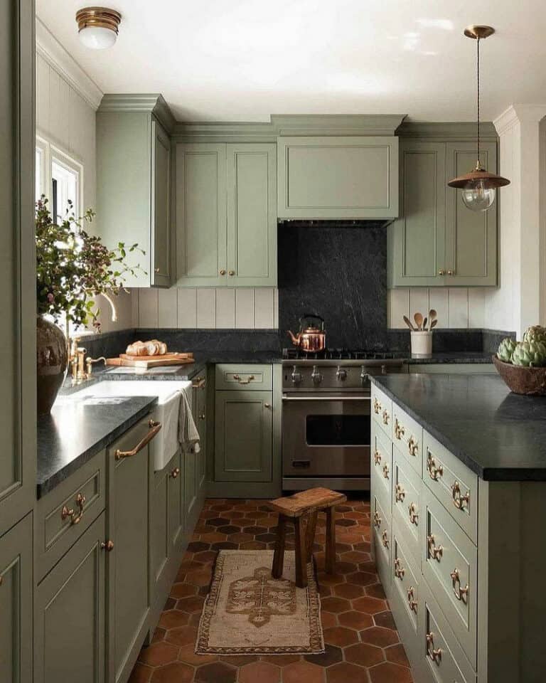 olive green kitchen cabinets with black countertops feature