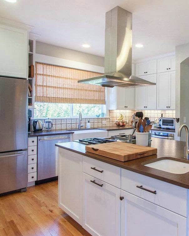 white cabinets with brown quartz countertops feature