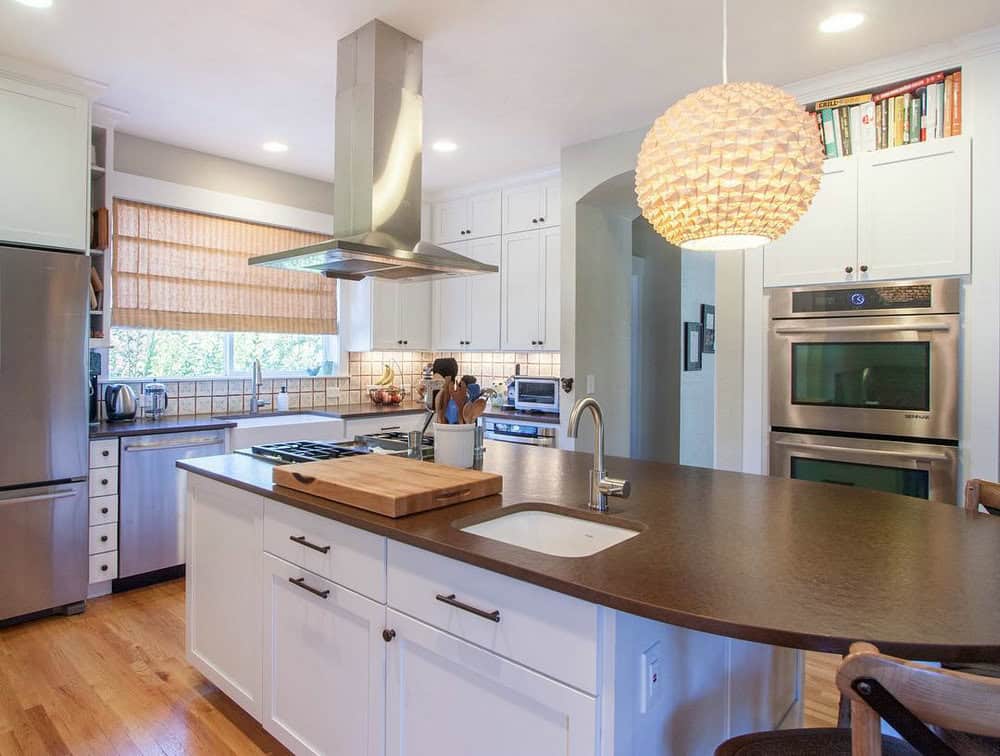 white cabinets with brown quartz countertops