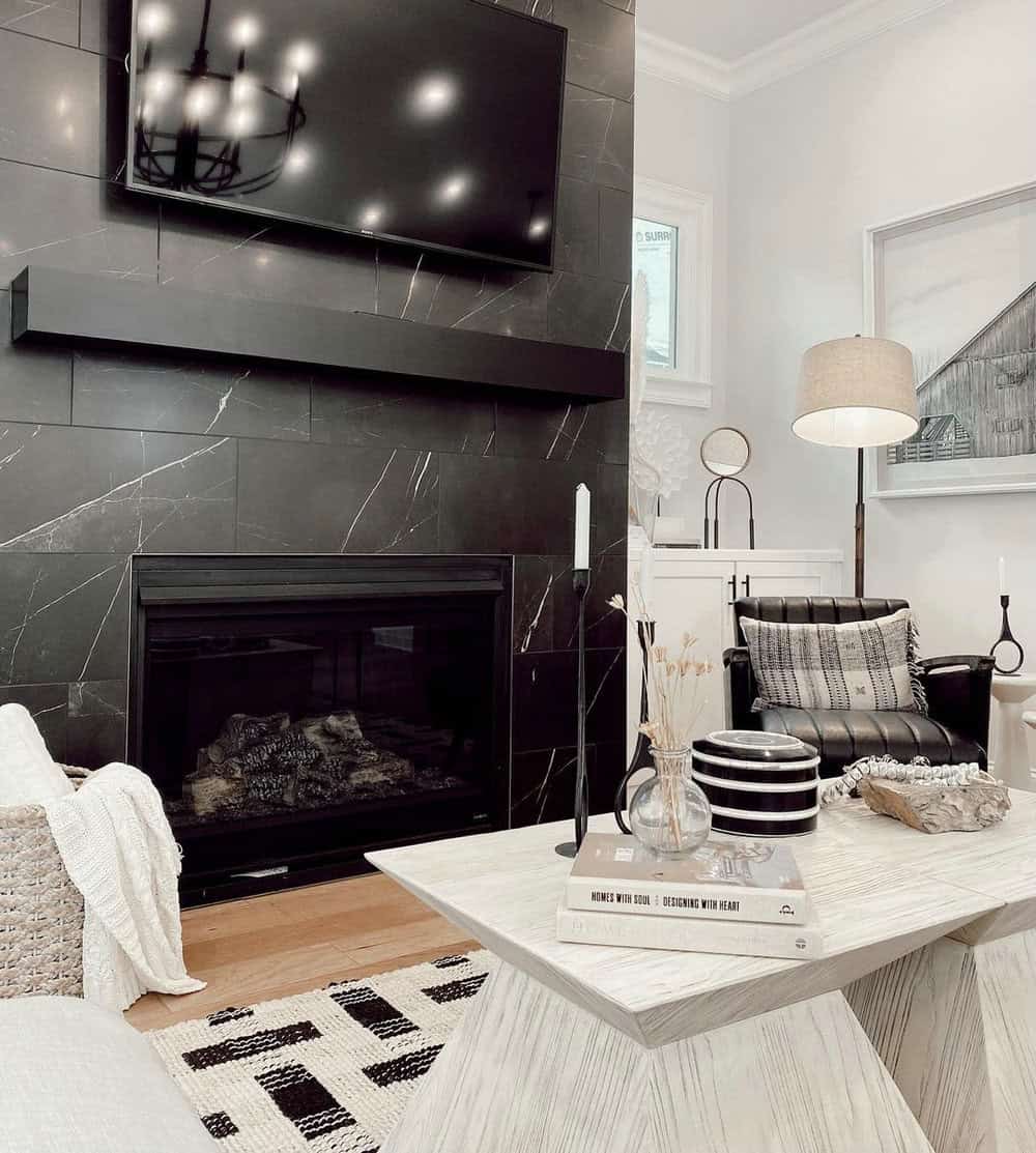 living rooms with black fireplaces