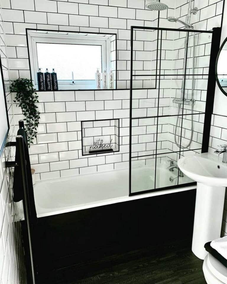 shower white subway tile black grout feature