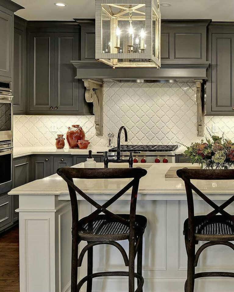 dark grey cabinets with white countertops feature