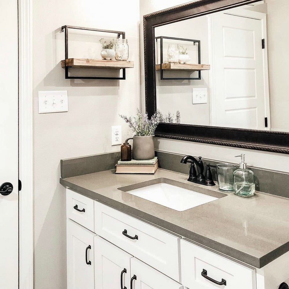 dark grey countertops with white cabinets