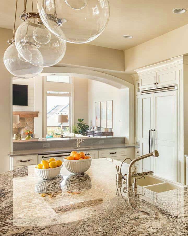 beige countertops with white cabinets feature