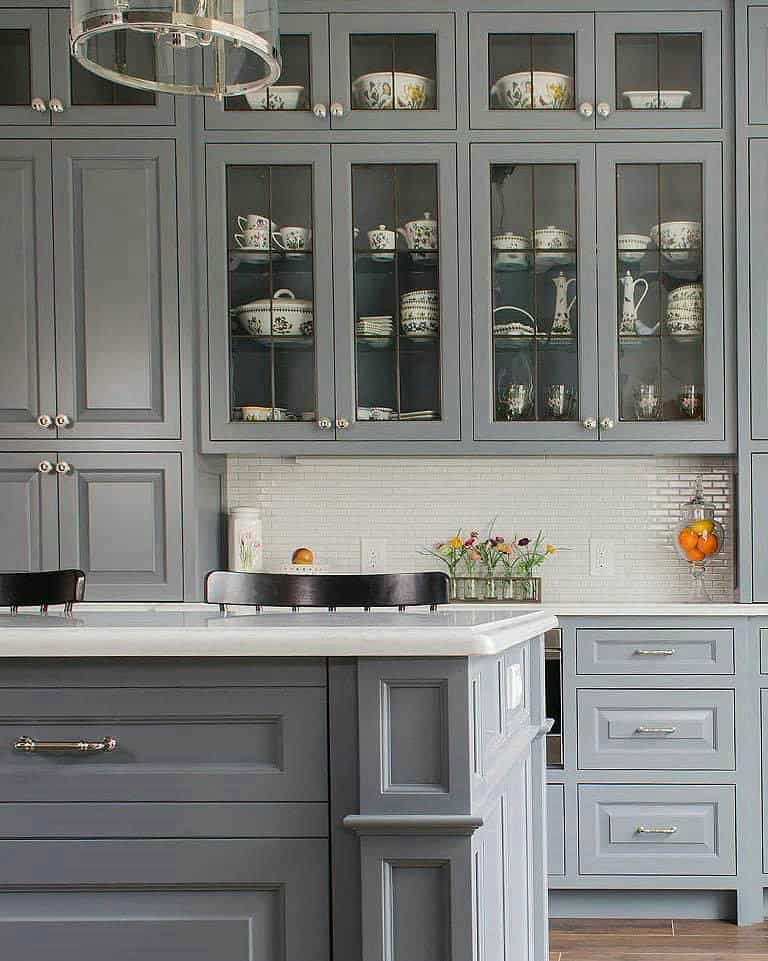 light grey cabinets with white countertops feature