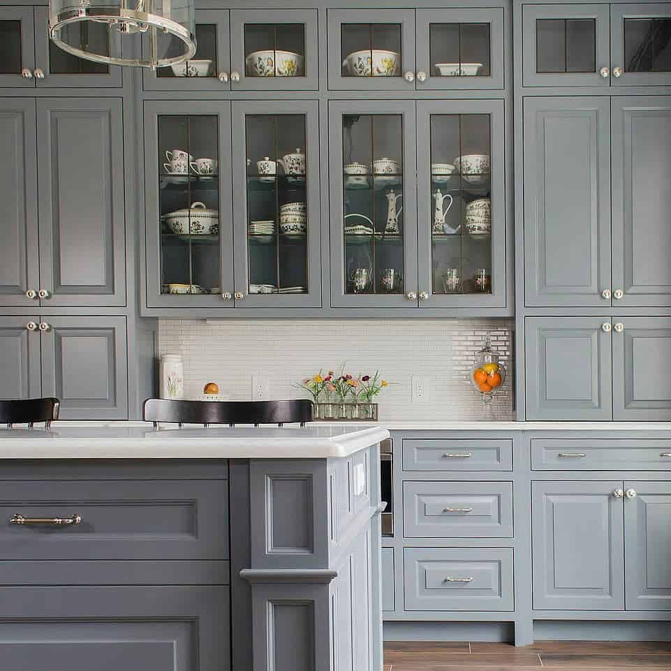 light grey cabinets with white countertops