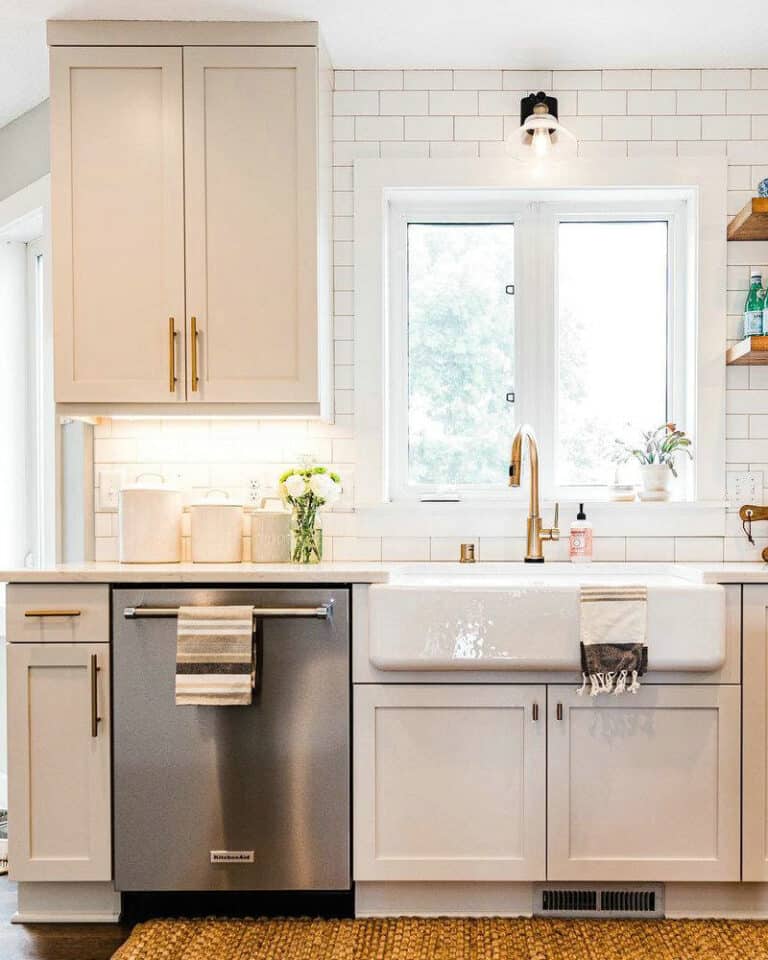 off white kitchen cabinets with quartz countertops feature