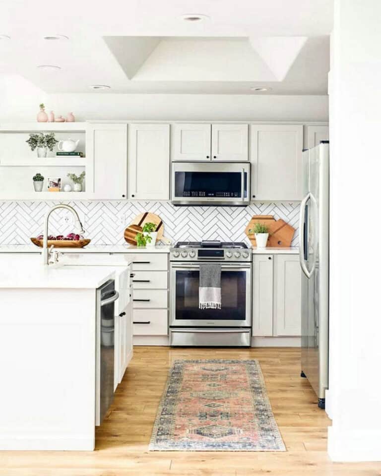 white kitchens with black handles feature