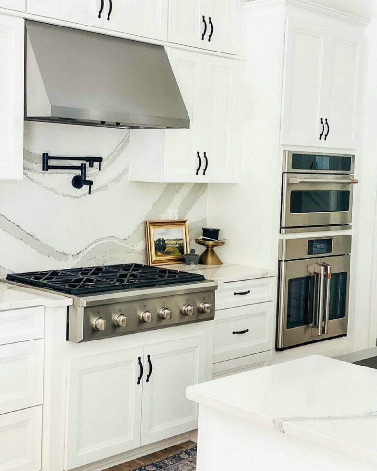 white kitchen cabinets with black knobs feature