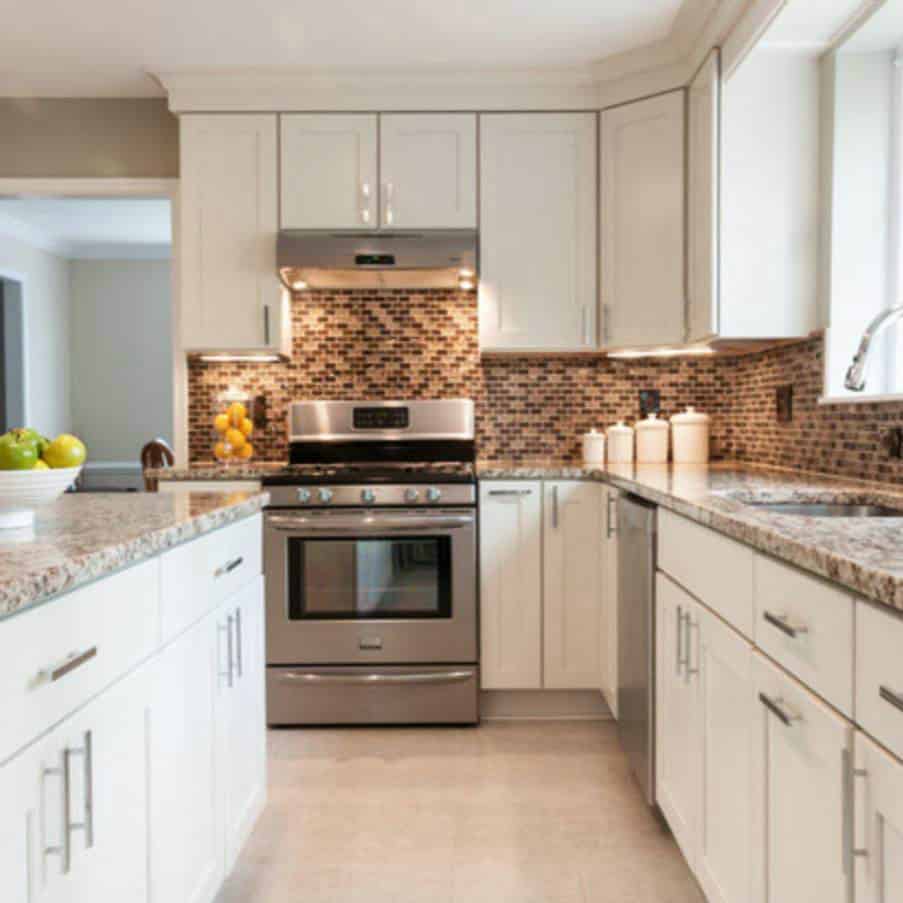 st cecilia granite with white cabinets