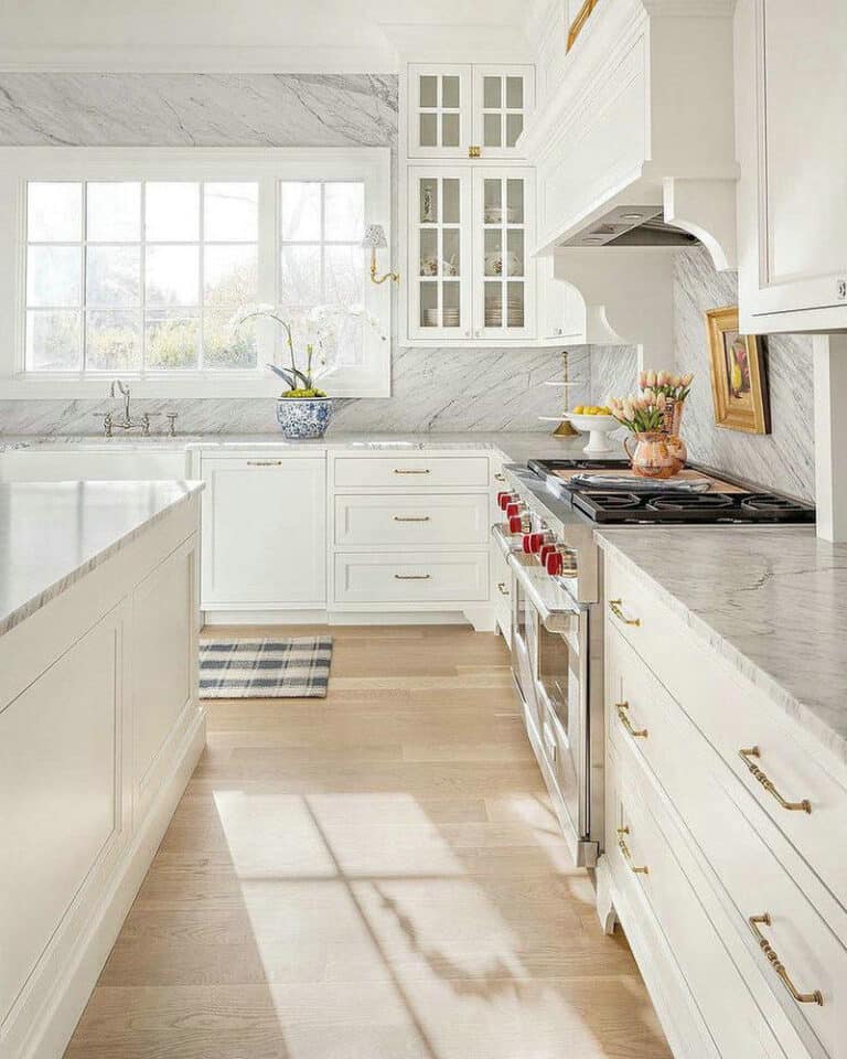 white kitchen cabinets with beige tile floor feature