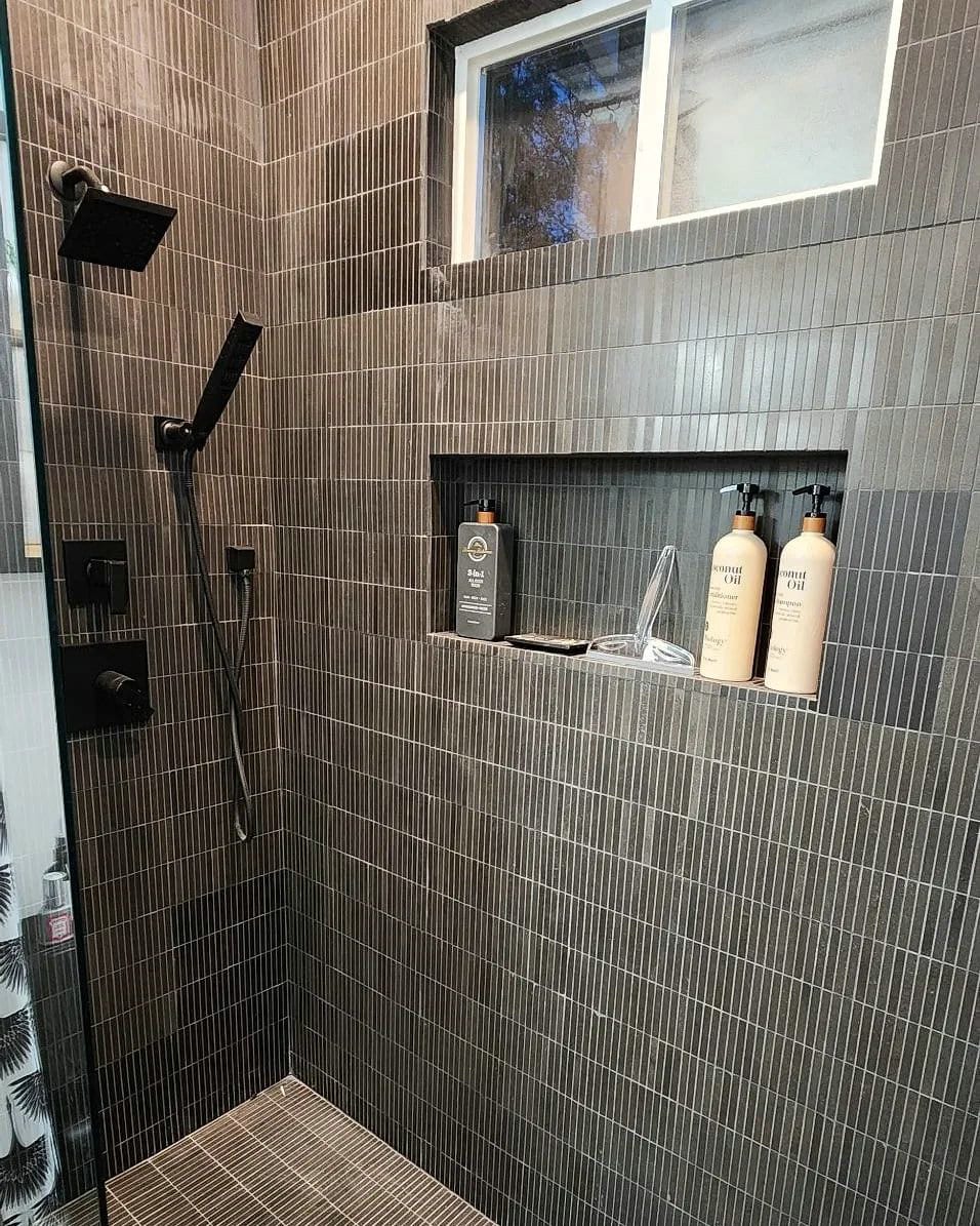 bathrooms with dark tile