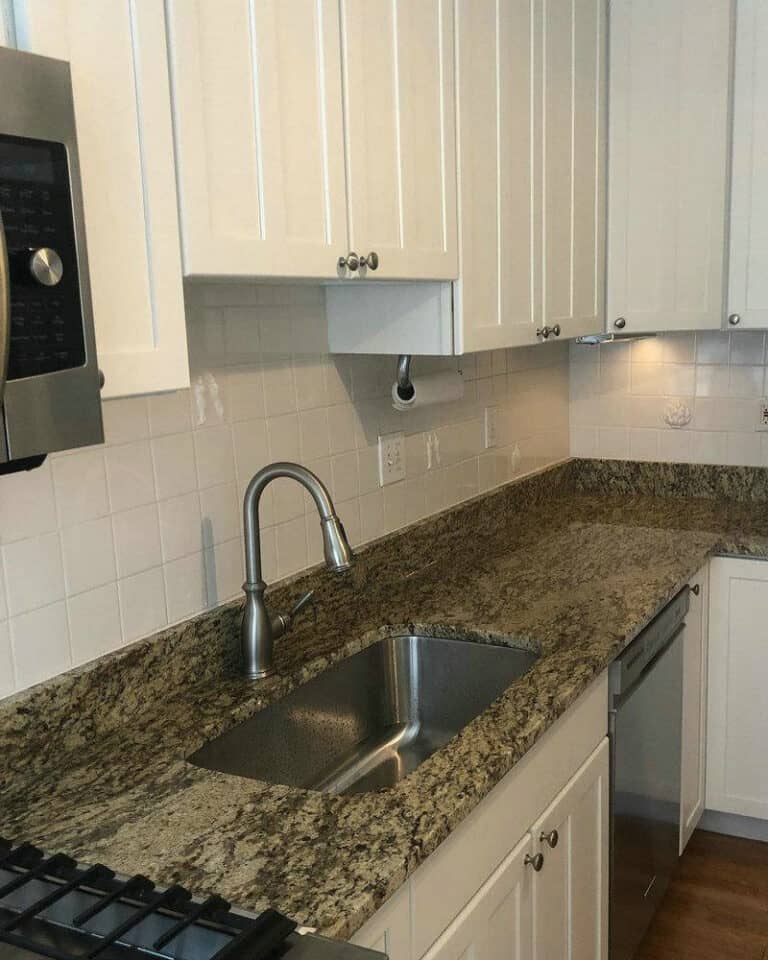 venetian gold granite with white cabinets feature