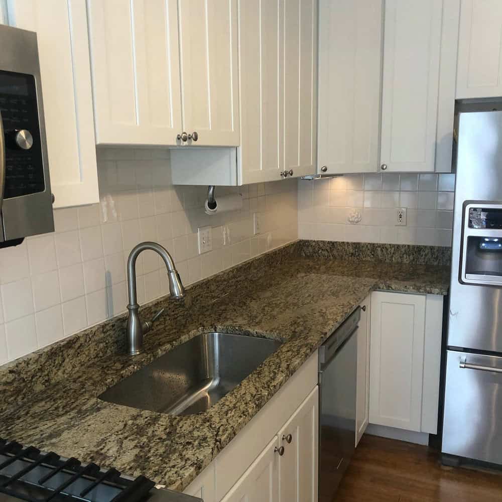 venetian gold granite with white cabinets