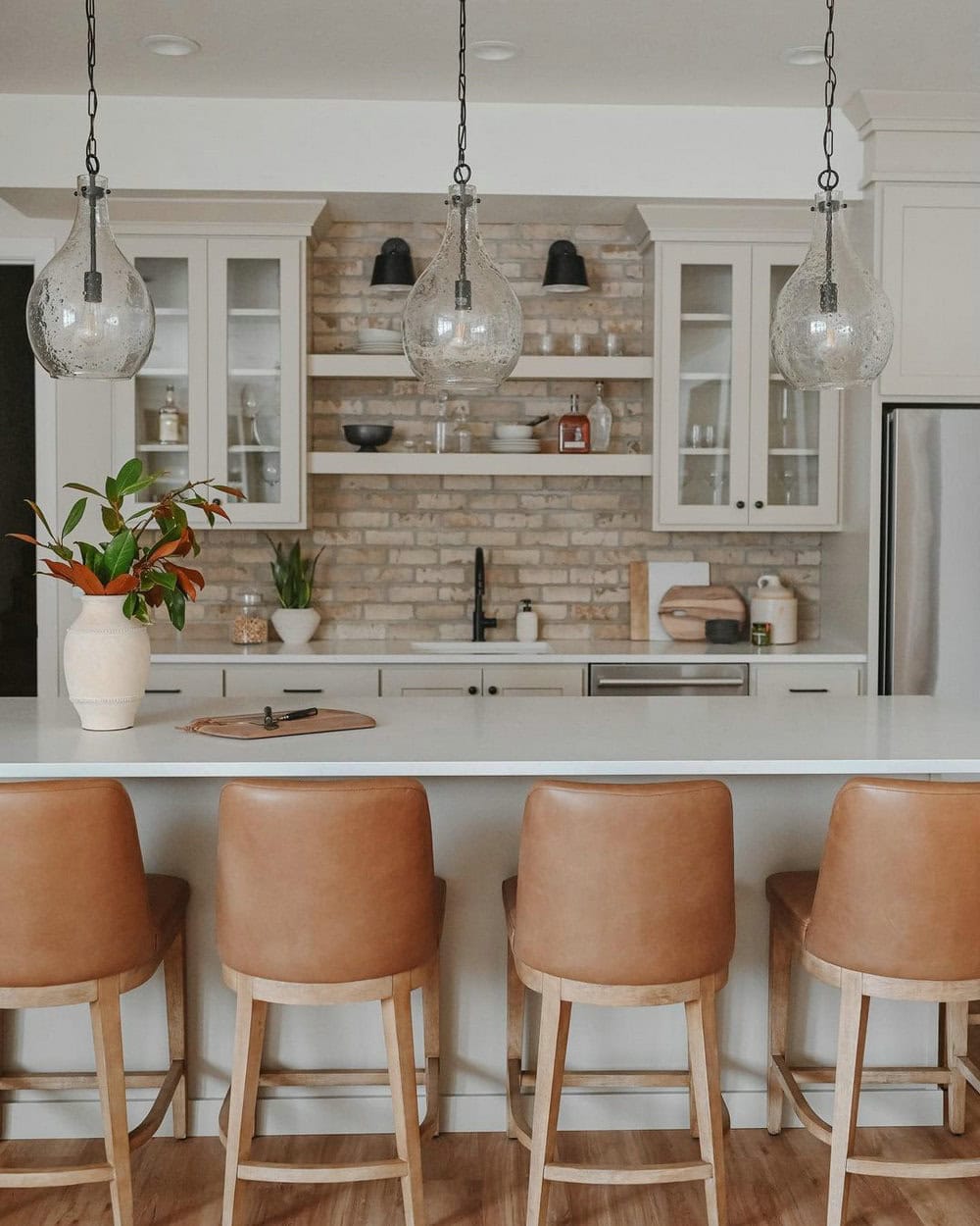 white cabinets beige backsplash