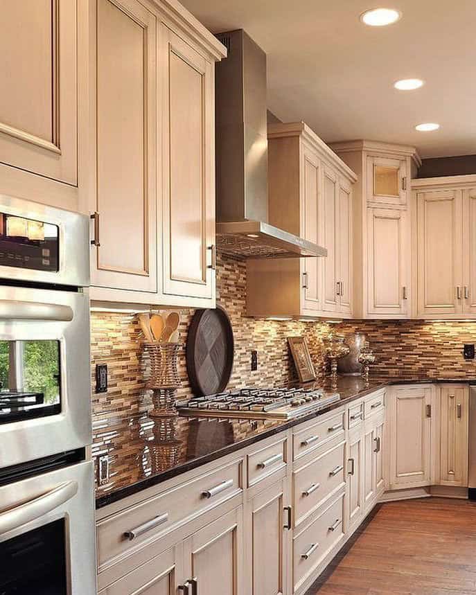 backsplash with dark granite countertops