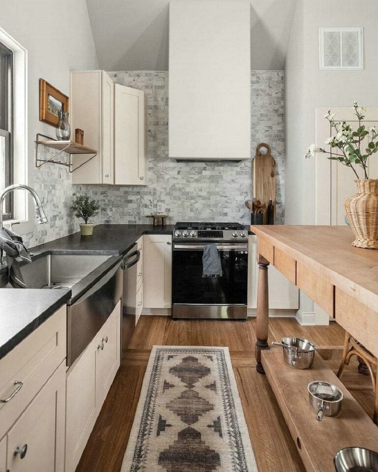 backsplash tile with black granite countertops feature