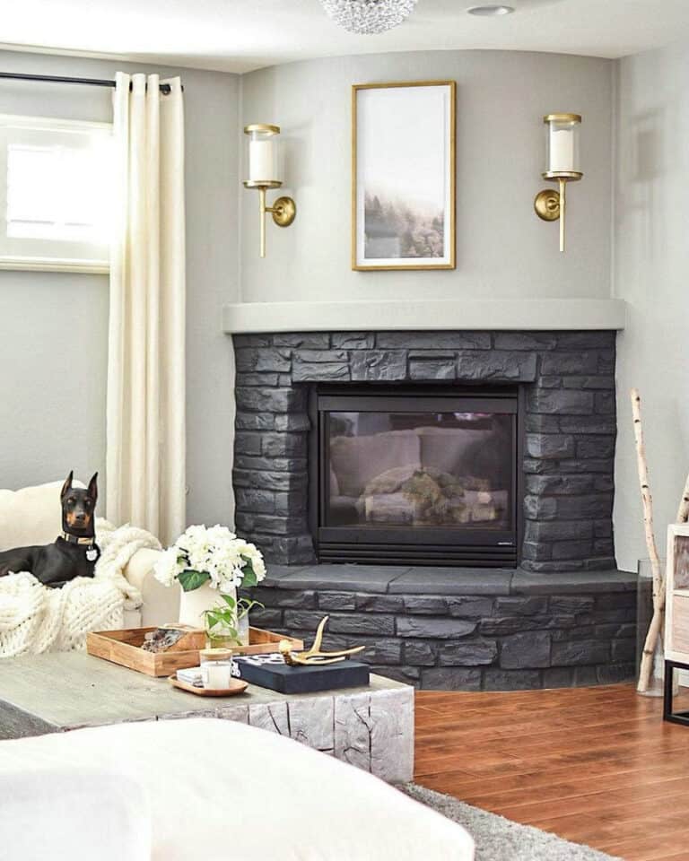 rounded stone fireplace feature