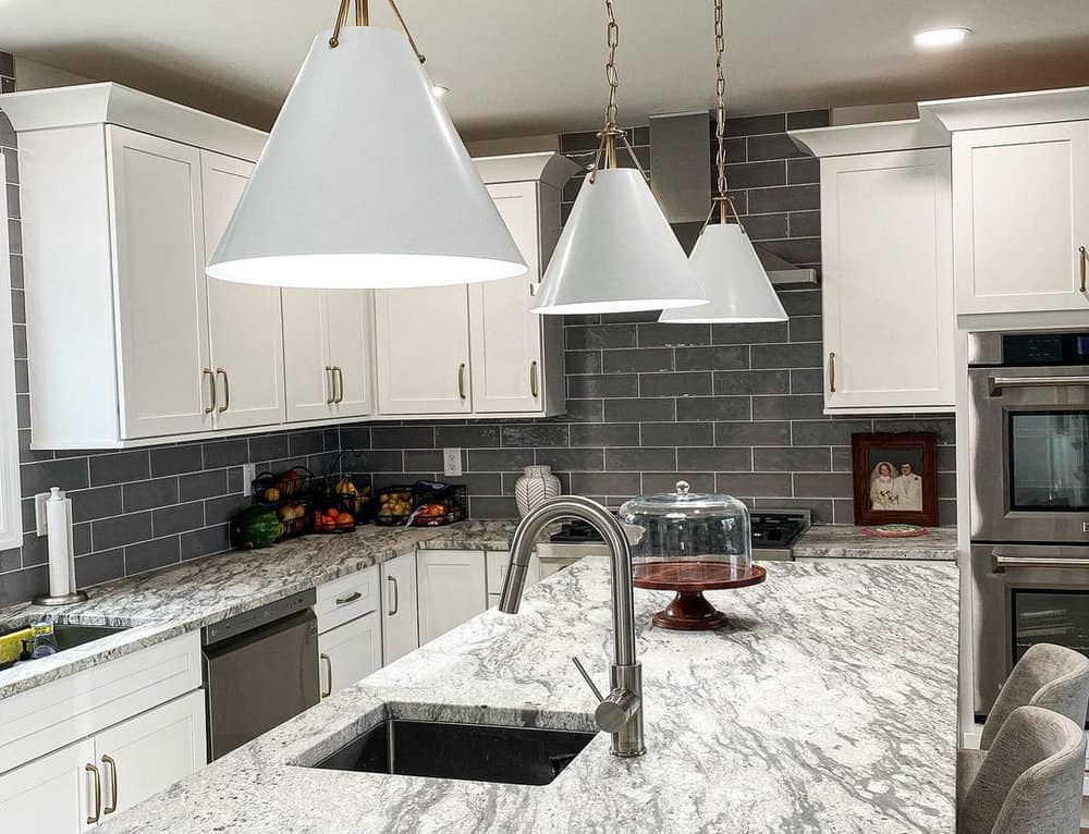 subway tile backsplash with granite countertop